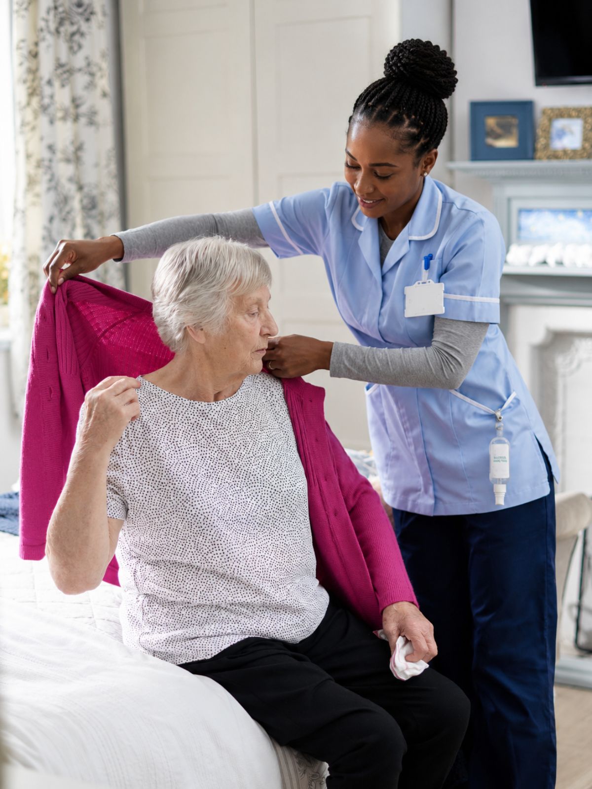 Personalised care assistance helping a senior with daily routines