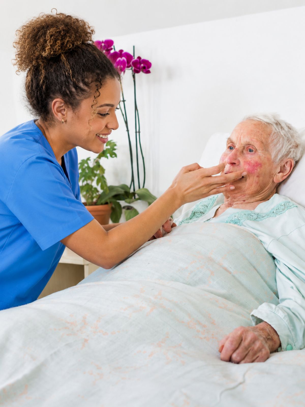Friendly caregiver building meaningful relationships with an elderly client